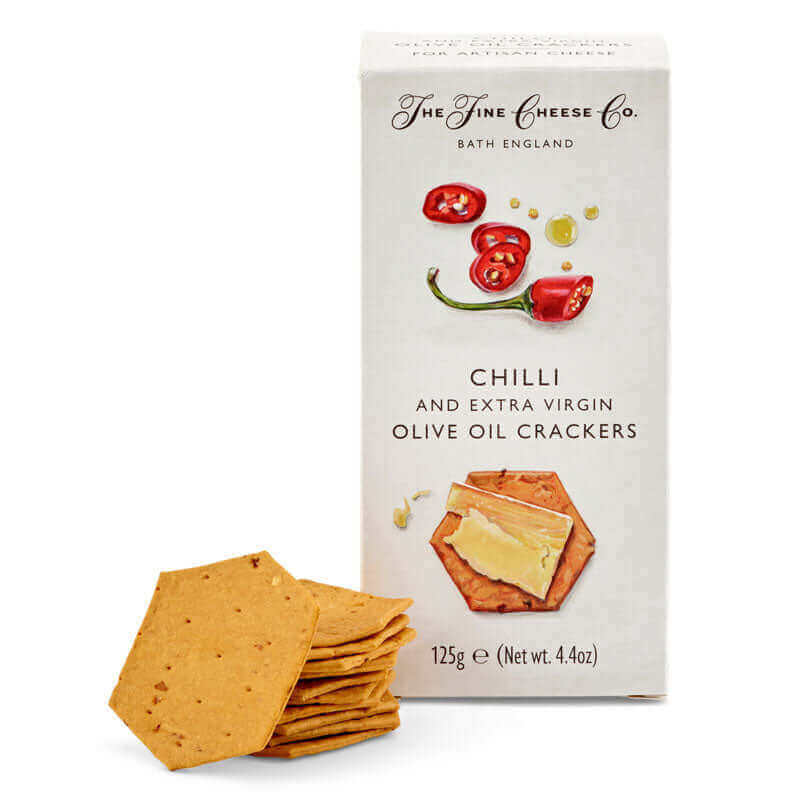Spicy Trio Cheese Hamper accessorized with Chilli and Extra Virgin Olive Oil Crackers for a bold culinary experience.