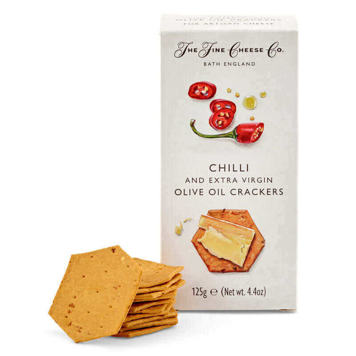 Spicy Trio Cheese Hamper accessorized with Chilli and Extra Virgin Olive Oil Crackers for a bold culinary experience.