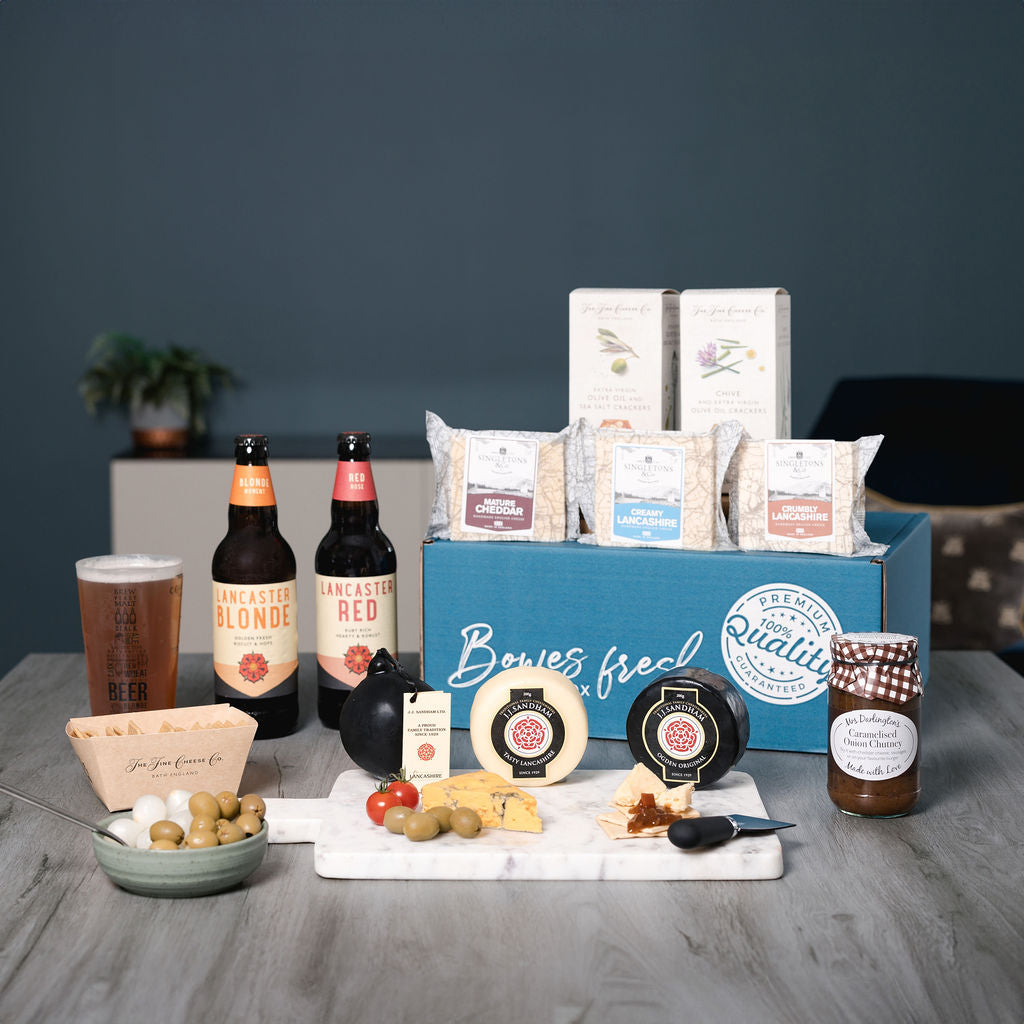 Lancashire produce cheese truckles in this luxury cheese gift box hamper with wine or beer - created by Bowes Dairy Produce